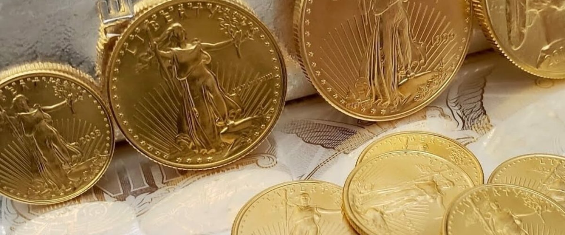 Is it better to own gold coins or bars?